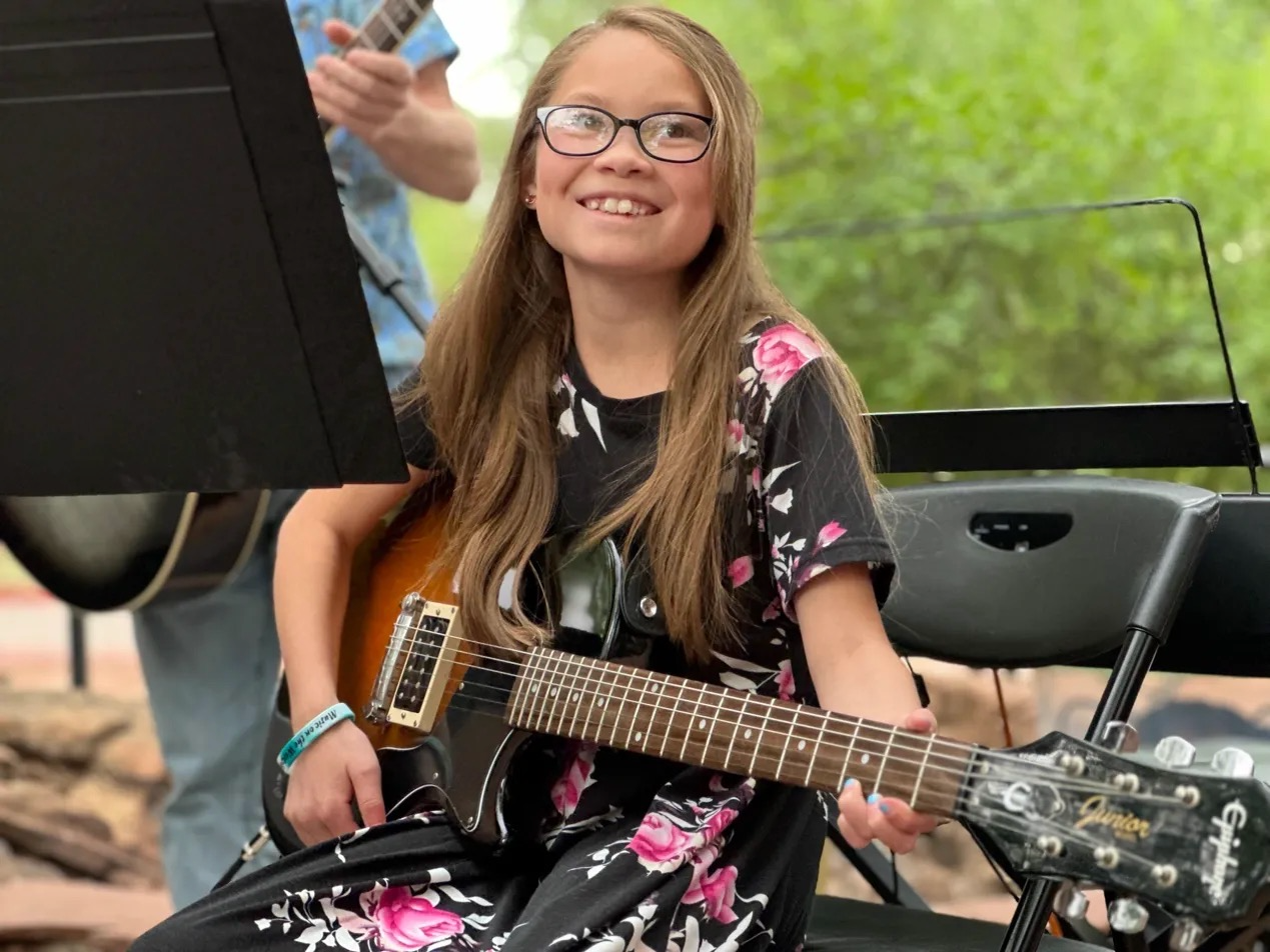 Guitar student performing at Music on the Westside