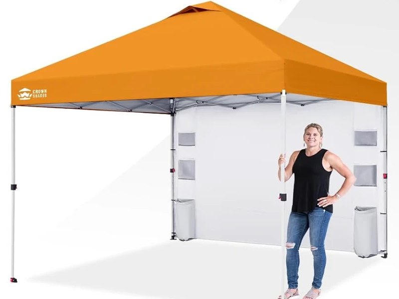 Orange 10 by 10 foot pop-up canopy tent with a sidewall